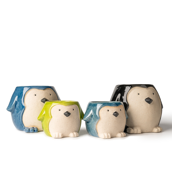 Candelabros de cerámica con forma de pingüino: adorable y acogedor arte de luces y sombras